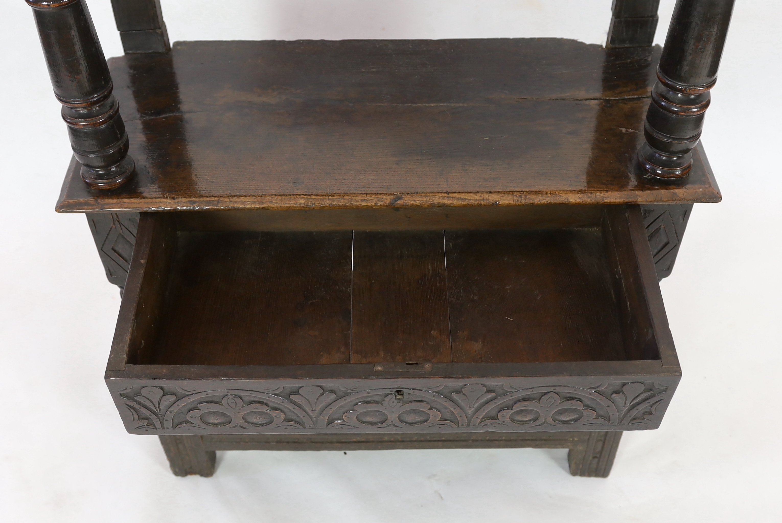 An early 17th century oak three tier buffet